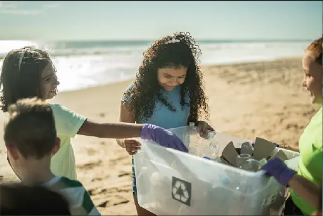 Learning by doing: beach cleanups are an effective way to teach kids about the ocean.