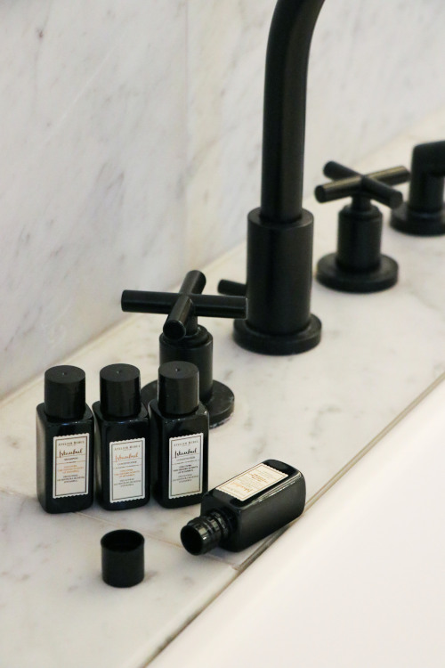 Small shower gel and shampoo bottles are a popular amenity in hotels.