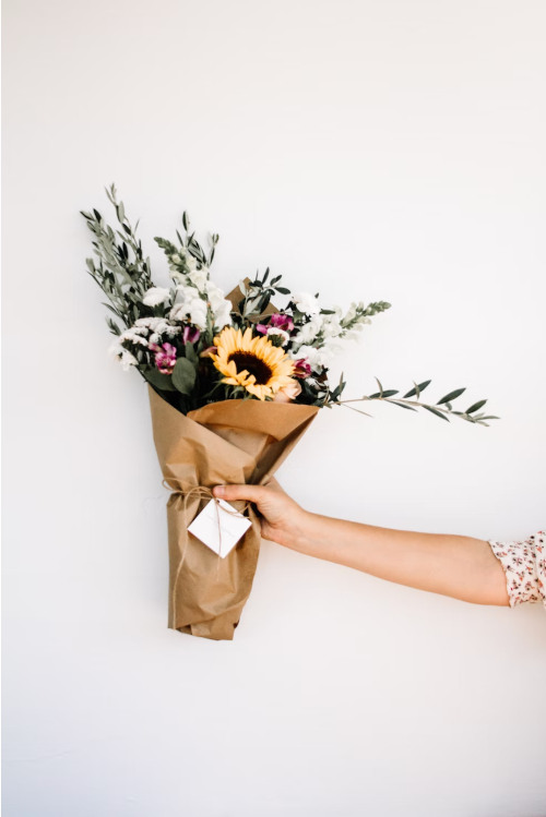 Choose flowers wrapped in paper - or pluck them from your own garden.