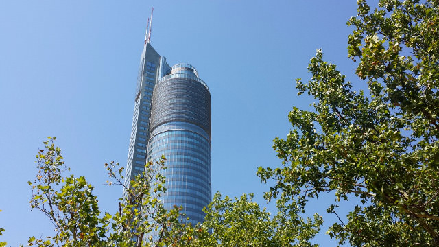 A modern building made of stainless steel and glass